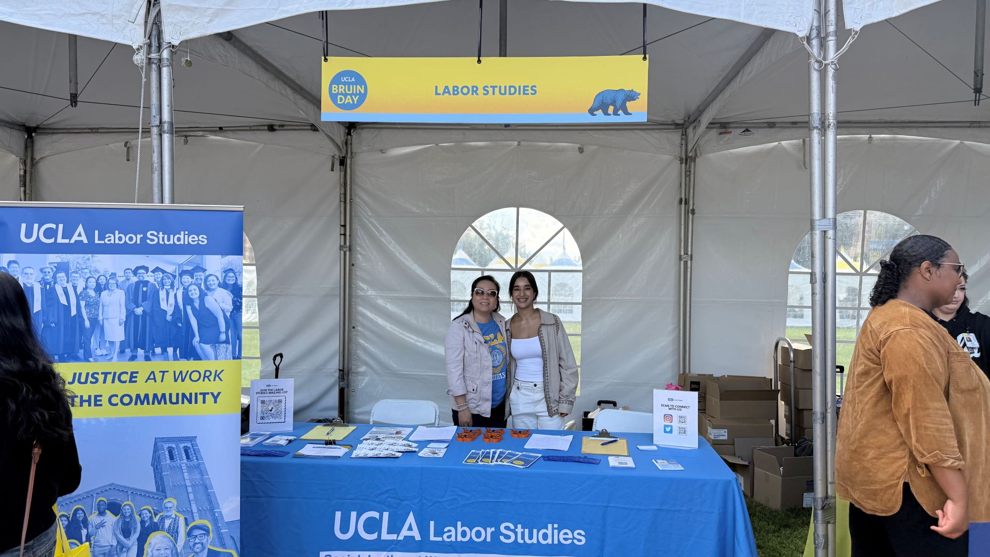 Two women posing for a photo during Bruin Day
