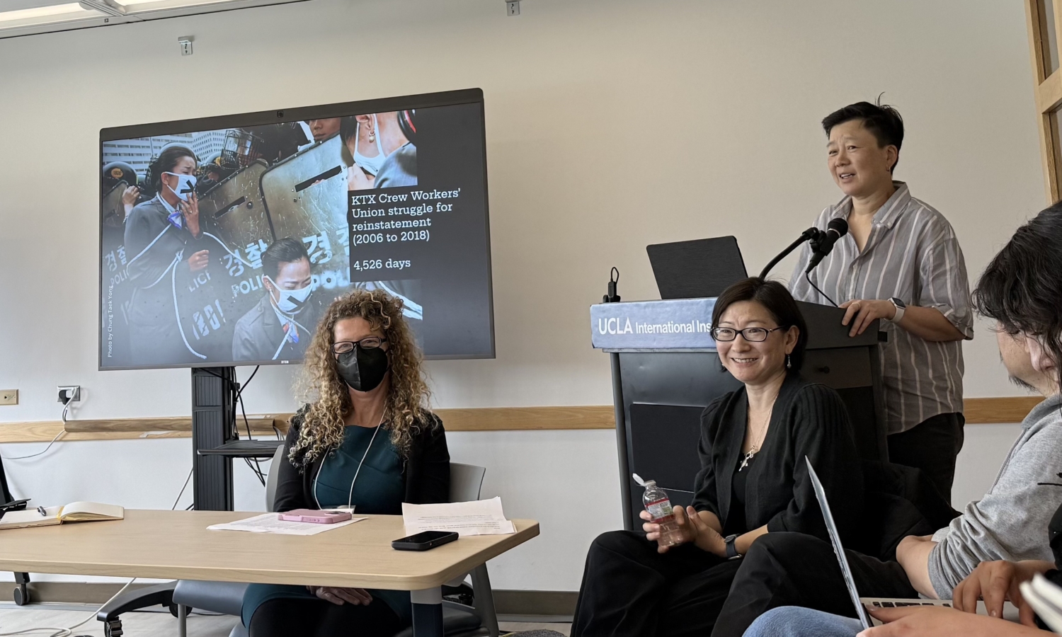 Ju Hui Judy Han presents findings from the book Against Abandonment: Repertoires of Solidarity in South Korean Protest alongside co-author and UCLA Labor Studies chair Jennifer Jihye Chun / UCLA Labor Studies